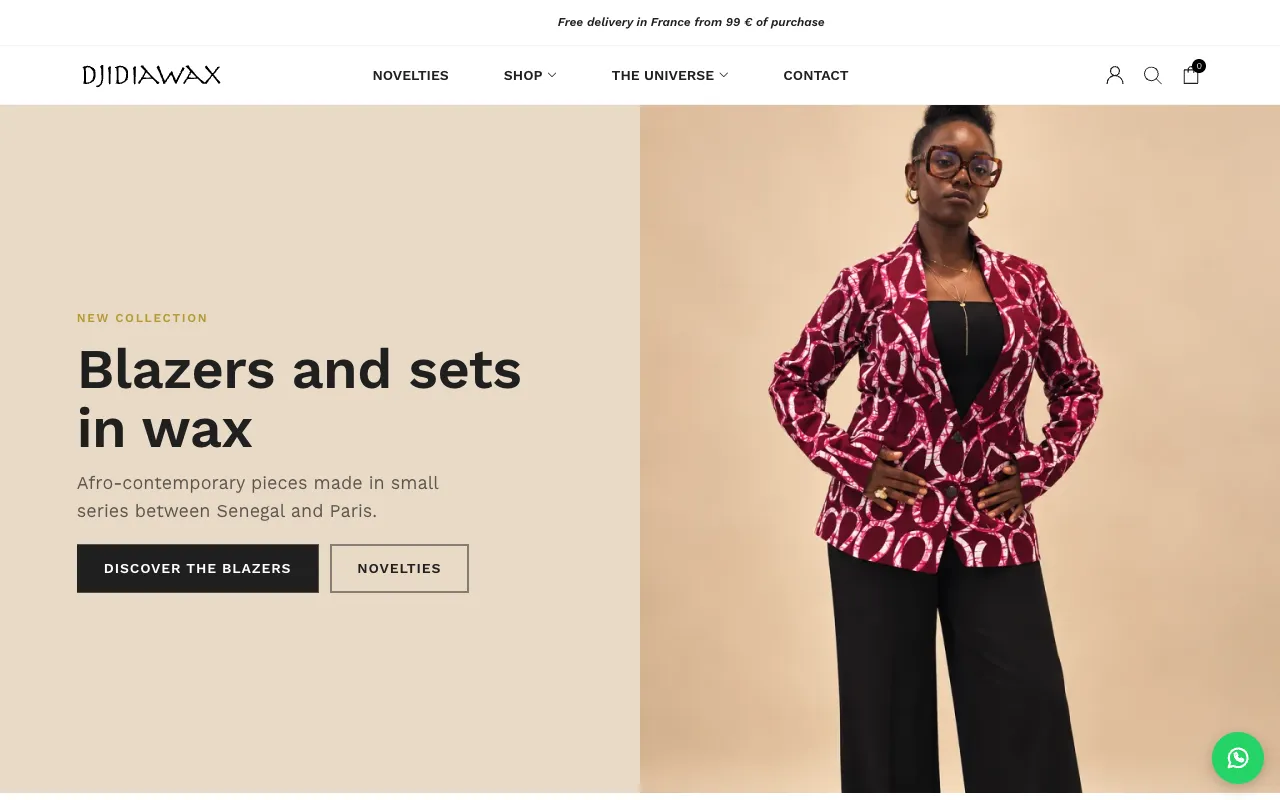 The new home page of djidiawax.com, translated into English: the headline “Blazers and sets in wax” next to a woman wearing a burgundy and pink wax blazer.